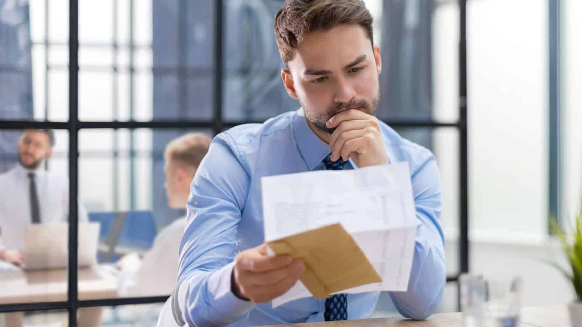 Man opening a subrogation letter